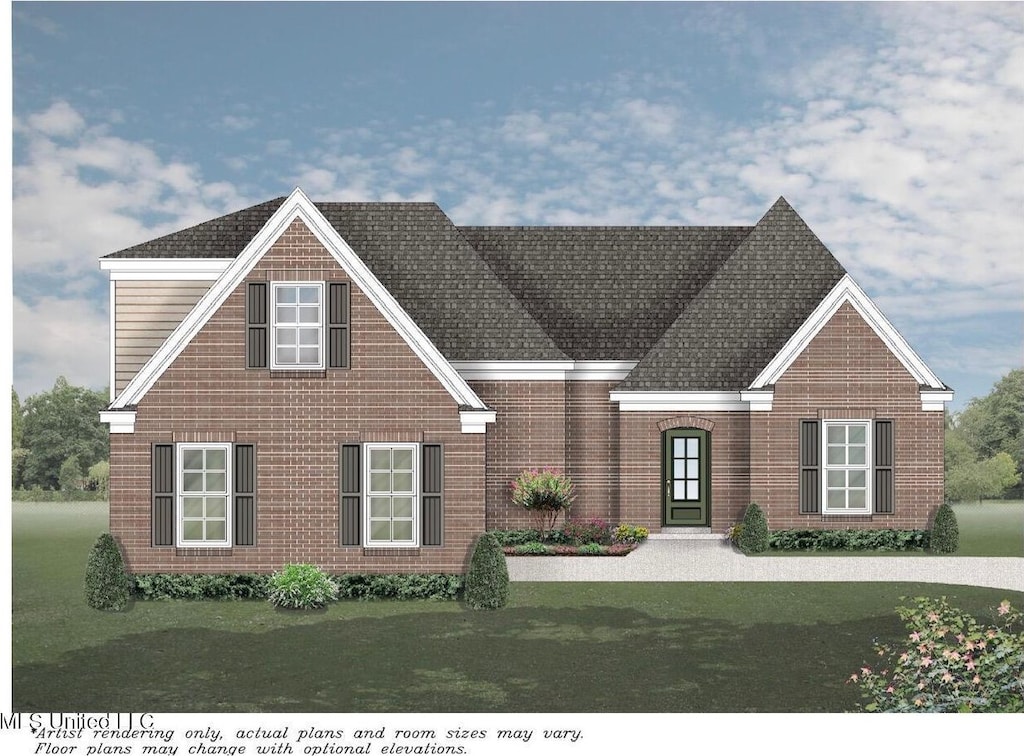 view of front facade with a front yard and brick siding