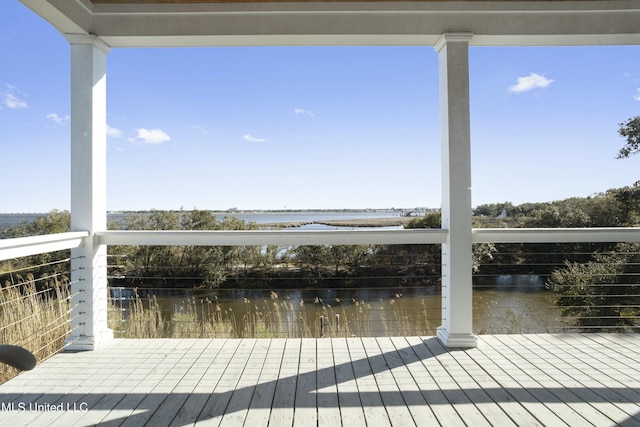 deck featuring a water view