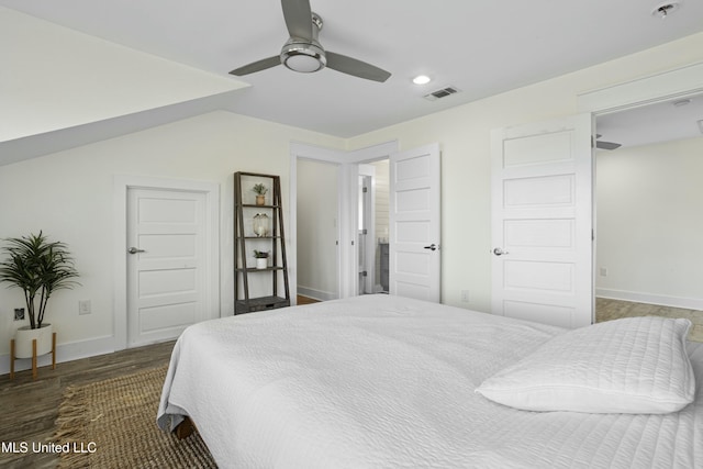 bedroom with visible vents, ceiling fan, baseboards, and wood finished floors