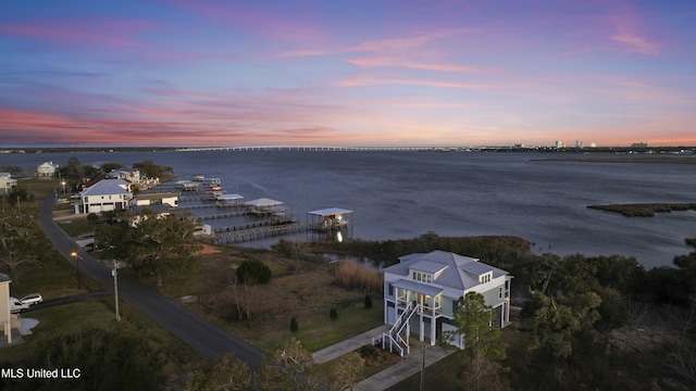 drone / aerial view with a water view