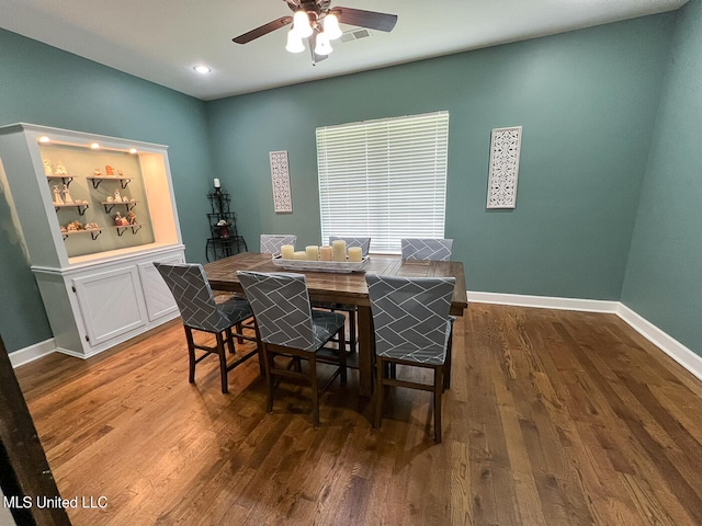 dining room with ceiling fan and hardwood / wood-style floors