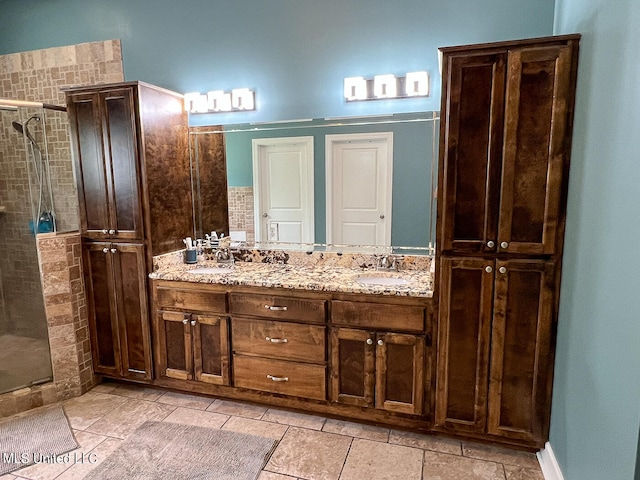 bathroom with vanity and an enclosed shower