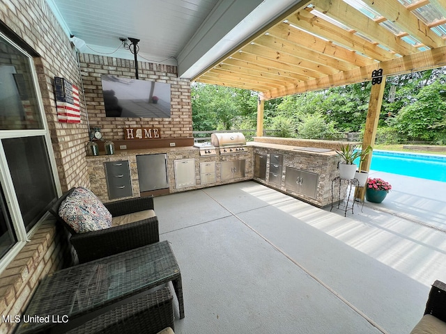 view of patio featuring area for grilling, a pergola, and a grill