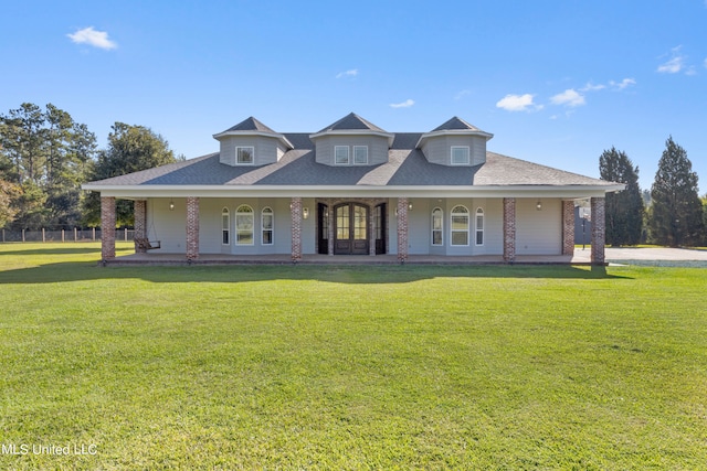 view of front of property featuring a front yard and a porch