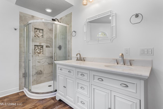 10186 Wire Rd, Vancleave, MS 39565 - bathroom featuring a stall shower and double vanity