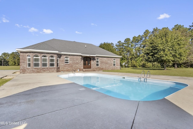10186 Wire Rd, Vancleave, MS 39565 - swimming pool featuring a lawn and a patio