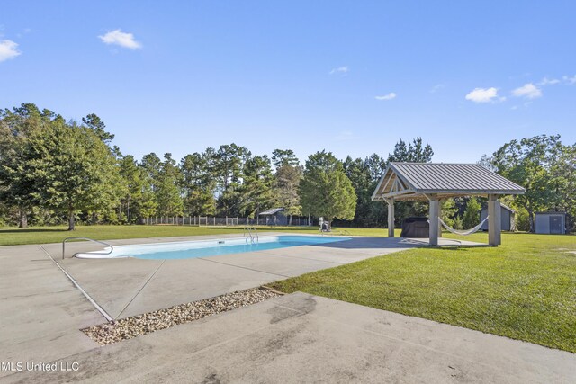 10186 Wire Rd, Vancleave, MS 39565 - outdoor pool featuring a gazebo, view of scattered trees, and a patio