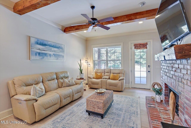 105 Victoria Pl, Madison, MS 39110 - living area with beam ceiling, a ceiling fan, a fireplace, crown molding, and light wood-type flooring