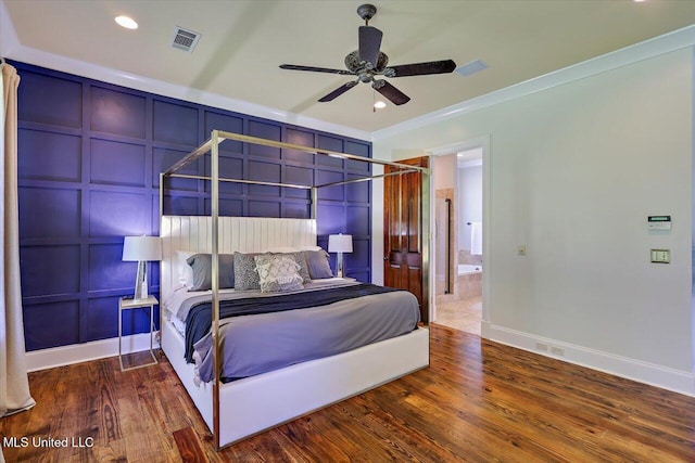 105 Victoria Pl, Madison, MS 39110 - bedroom featuring wood finished floors, a decorative wall, crown molding, ensuite bathroom, and recessed lighting