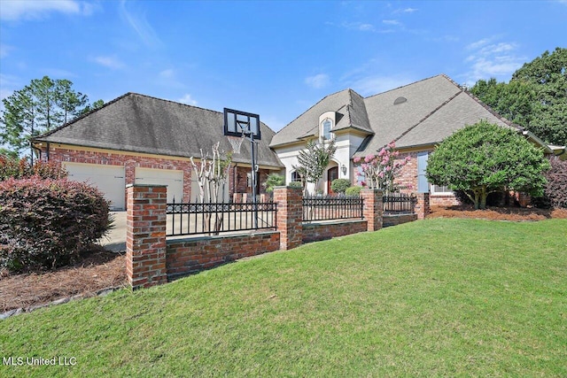 105 Victoria Pl, Madison, MS 39110 - view of front of property with an attached garage, brick siding, and roof with shingles