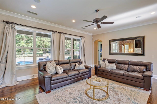 105 Victoria Pl, Madison, MS 39110 - living room with dark wood-style flooring, arched walkways, crown molding, ceiling fan, and recessed lighting