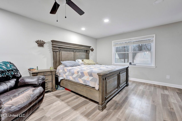 bedroom featuring ceiling fan and light wood-type flooring