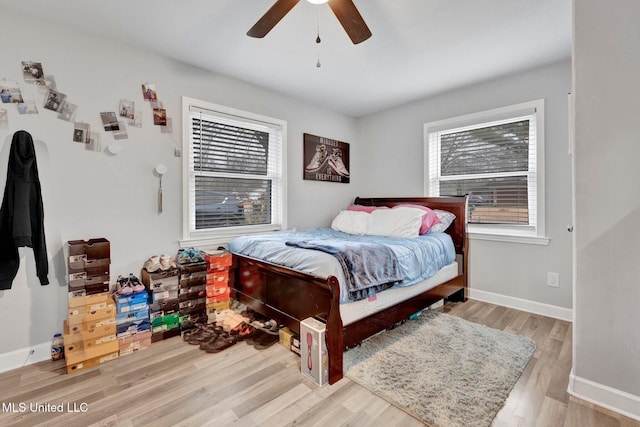 bedroom featuring ceiling fan and light hardwood / wood-style flooring