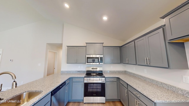 7908 Gardendale Dr, Olive Branch, MS 38654 - kitchen featuring gray cabinets, stainless steel appliances, light stone countertops, and a sink