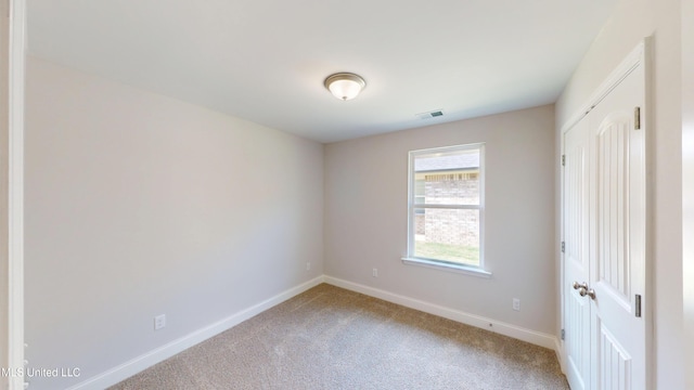 7908 Gardendale Dr, Olive Branch, MS 38654 - carpeted spare room featuring visible vents and baseboards
