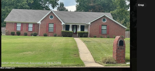 view of front of home with a front lawn