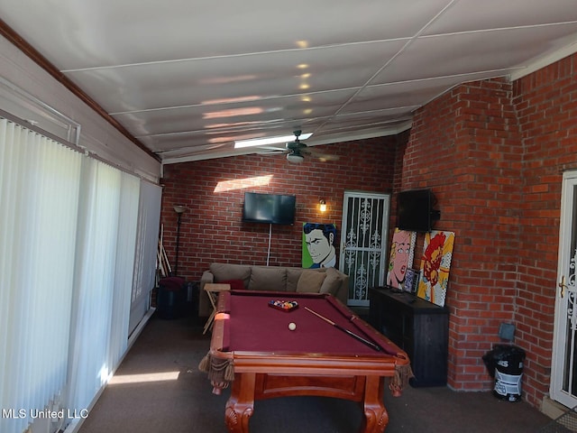 rec room featuring lofted ceiling, dark colored carpet, crown molding, billiards, and ceiling fan