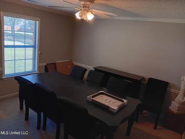 dining area with crown molding, a textured ceiling, and ceiling fan