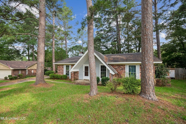 108 Fairdale Pl, Brandon, MS 39042 - view of front of house featuring a chimney and brick siding