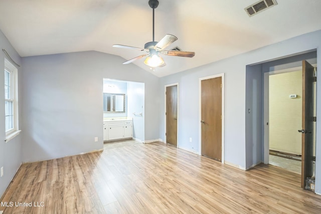 108 Fairdale Pl, Brandon, MS 39042 - unfurnished bedroom featuring light wood-style flooring, lofted ceiling, ensuite bath, and ceiling fan