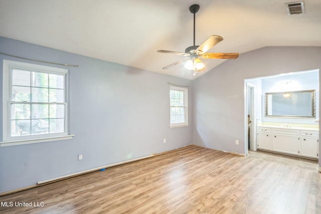 108 Fairdale Pl, Brandon, MS 39042 - spare room featuring light wood finished floors, lofted ceiling, and a ceiling fan