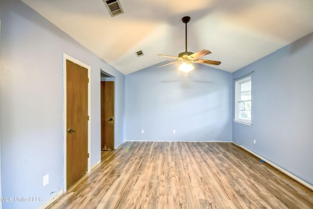 108 Fairdale Pl, Brandon, MS 39042 - unfurnished room with ceiling fan, light wood finished floors, and vaulted ceiling