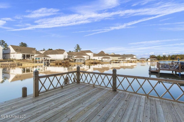 dock area featuring a water view