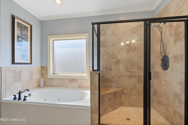 full bathroom featuring a jetted tub, a shower stall, and ornamental molding