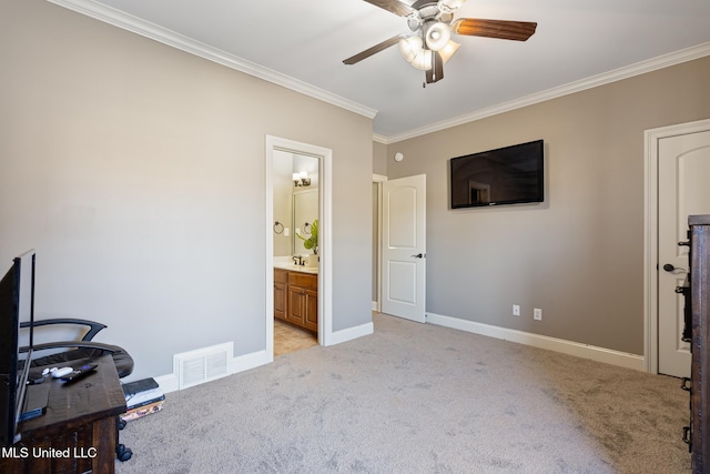 home office with visible vents, light colored carpet, and ornamental molding