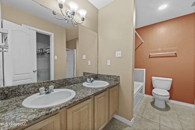 full bathroom featuring toilet, tile patterned floors, vanity, a notable chandelier, and shower with separate bathtub