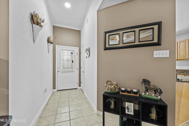 hallway featuring light tile patterned flooring and ornamental molding