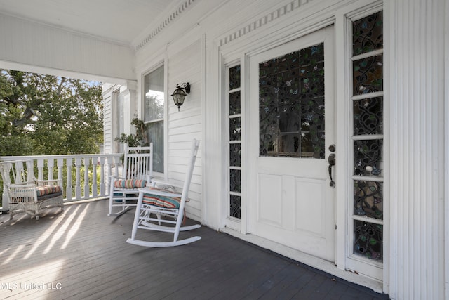 deck featuring covered porch