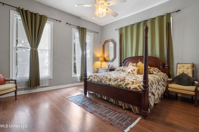 bedroom with hardwood / wood-style floors and ceiling fan