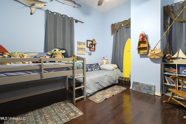 bedroom with wood finished floors