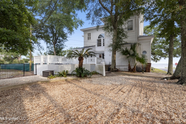 view of front of property featuring a deck