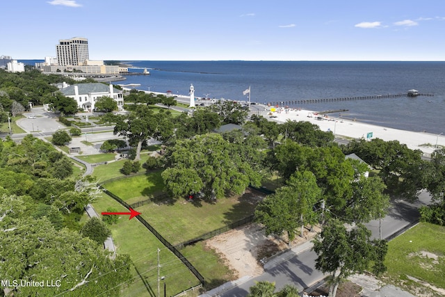aerial view of property's location with a nearby body of water