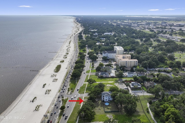 aerial view of a major roadway and a large body of water