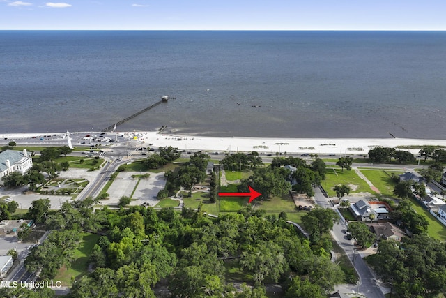 aerial view of property's location featuring a nearby body of water