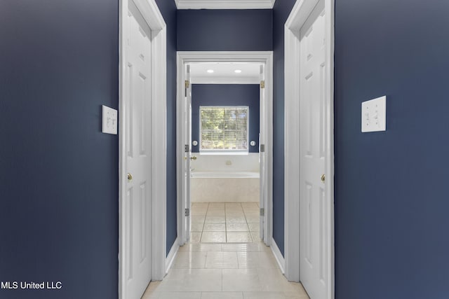 12880 Coles Cv, Gulfport, MS 39503 - corridor featuring light tile patterned floors, crown molding, and baseboards