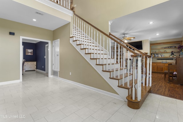 12880 Coles Cv, Gulfport, MS 39503 - staircase with ceiling fan, baseboards, recessed lighting, tile patterned floors, and crown molding
