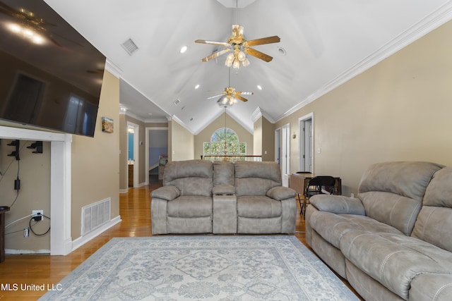 12880 Coles Cv, Gulfport, MS 39503 - living area with a ceiling fan, wood finished floors, vaulted ceiling, baseboards, and recessed lighting