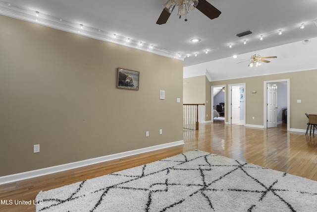 12880 Coles Cv, Gulfport, MS 39503 - unfurnished room featuring ceiling fan, ornamental molding, light wood-type flooring, and baseboards