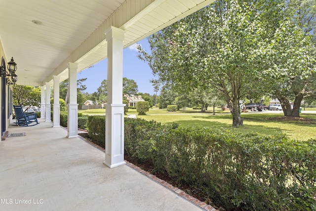 12880 Coles Cv, Gulfport, MS 39503 - covered porch featuring a lawn