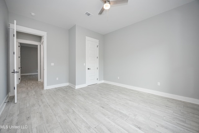 unfurnished bedroom featuring a closet, ceiling fan, and light hardwood / wood-style floors