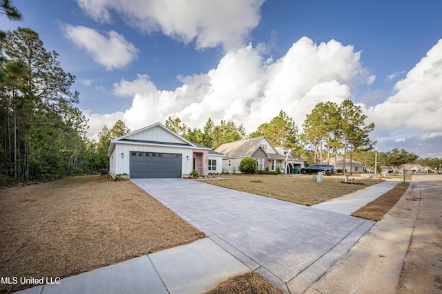 single story home with a front lawn and a garage