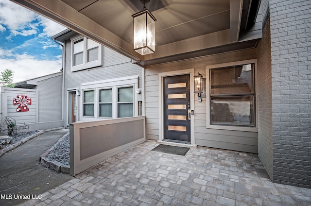 entrance to property with a patio area