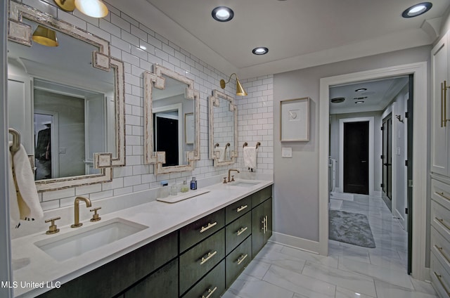 bathroom with vanity and backsplash