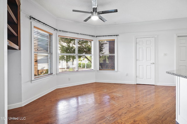 7906 Kirkwood Cv, Olive Branch, MS 38654 - unfurnished room with crown molding, ceiling fan, and wood finished floors