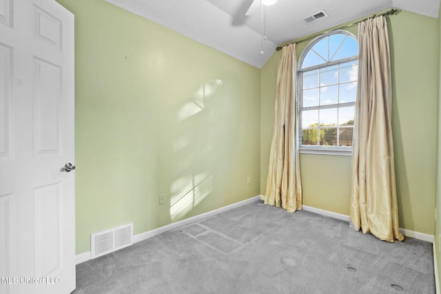 7906 Kirkwood Cv, Olive Branch, MS 38654 - unfurnished room featuring lofted ceiling, a ceiling fan, and carpet floors