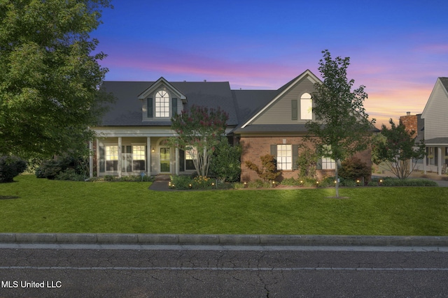7906 Kirkwood Cv, Olive Branch, MS 38654 - view of front of house with a yard and brick siding